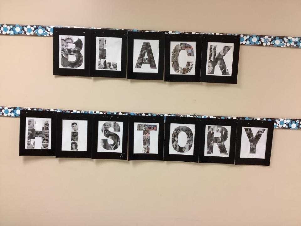 Student artwork outside of a classroom that says black history
