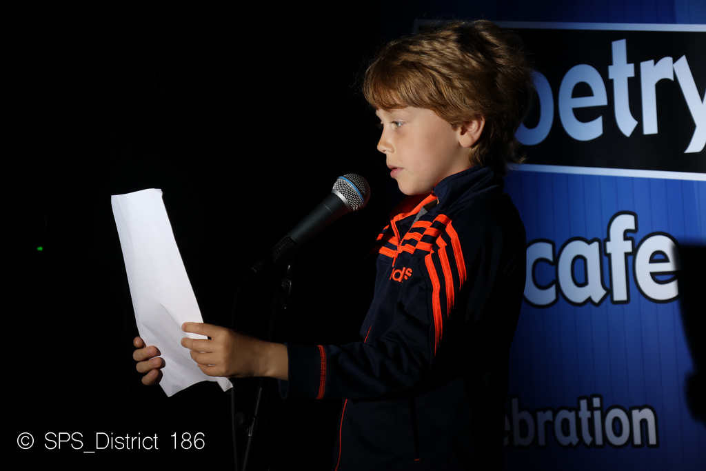 student reading poetry