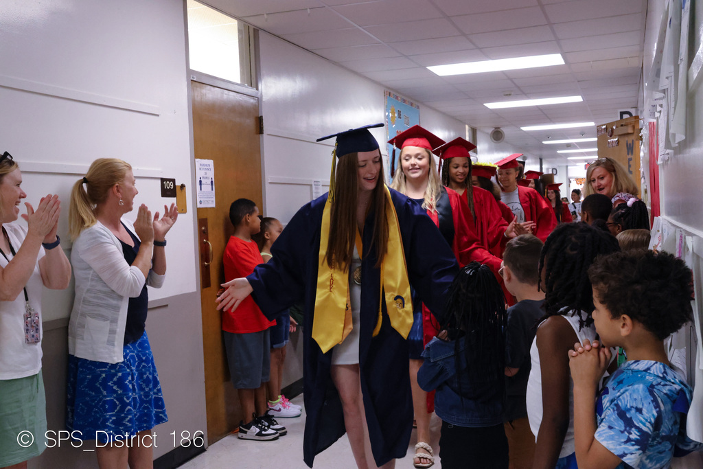 Graduates walk the halls