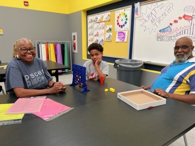 students and families playing games 