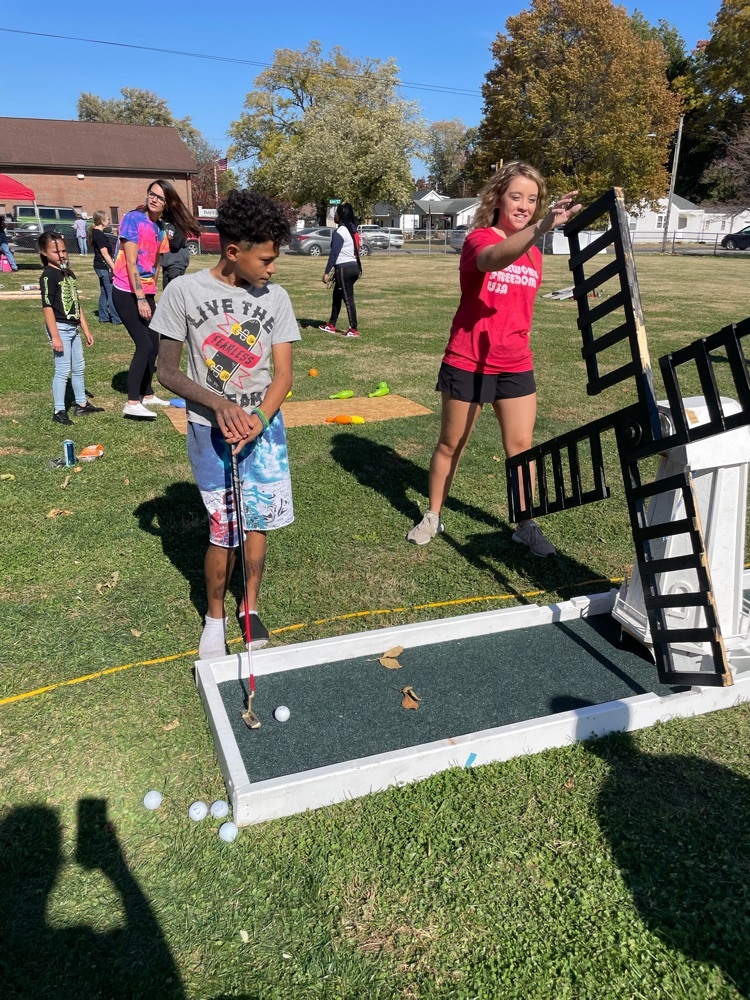 student golfing 