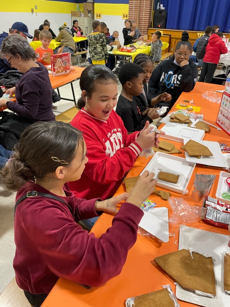 students making a gingerbread house 