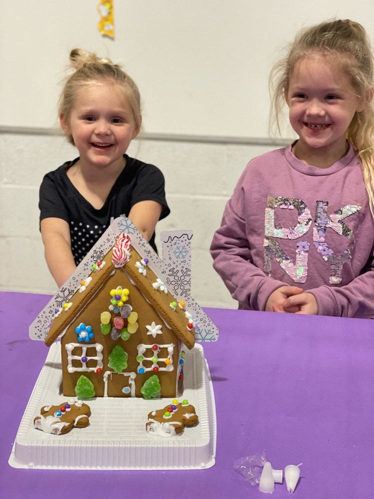 students smiling at Gingerbread Math Night